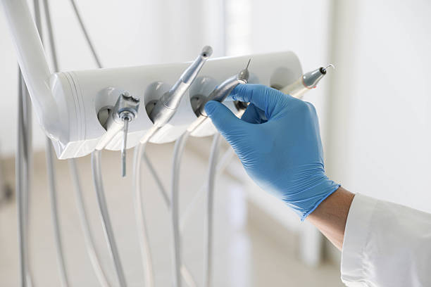 Professional Tooth Extraction technician working in Wolcott, IN